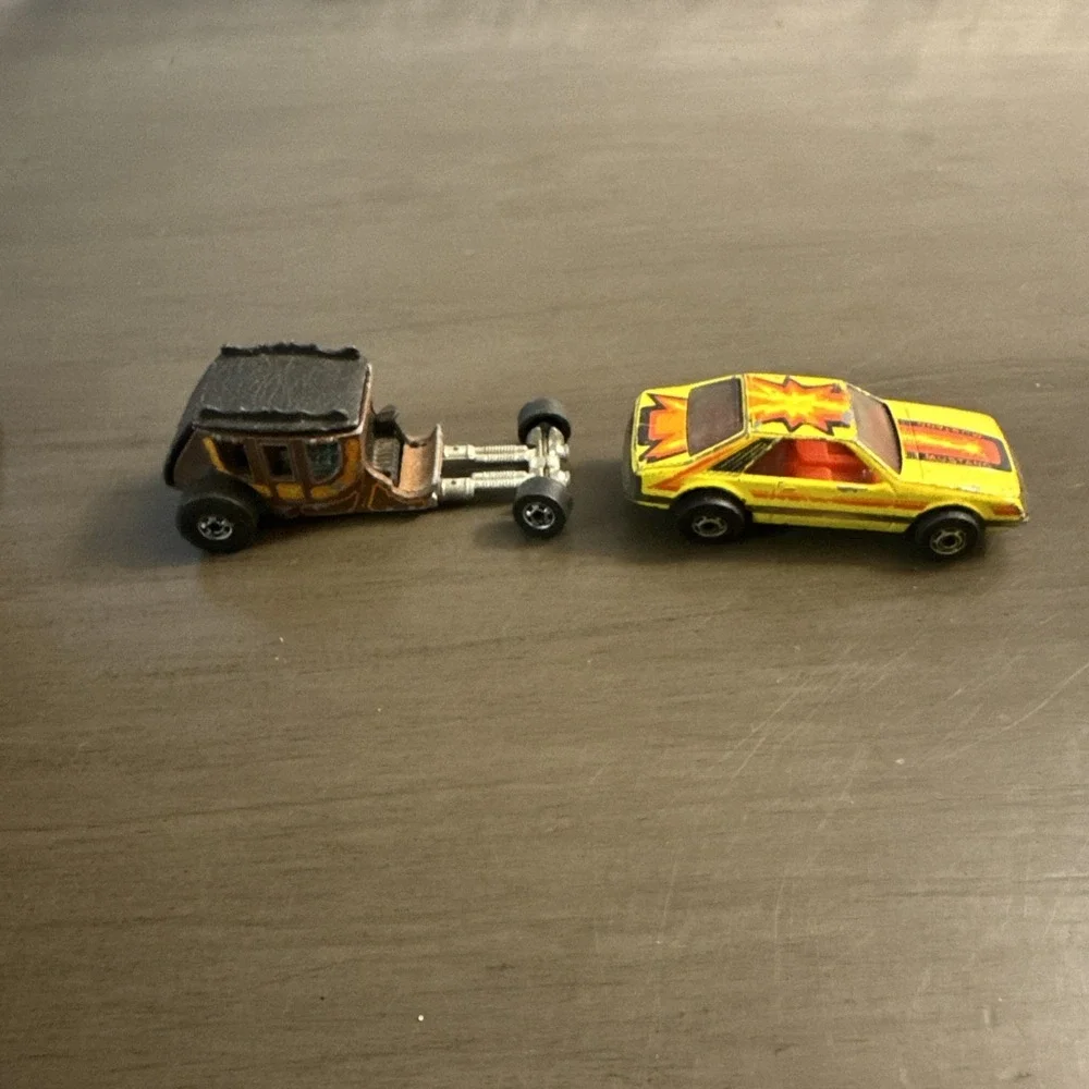 Hot Wheels 1977 Blue '37 Hot Bird Mustang Stage fright Tow Truck Black Wall Lot